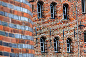 Details of windows and architecture of the gothic building Holstentor of Lübeck Schleswig Holstein Germany Europe