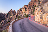 Winding road in the Calanche in evening light, westcoast between Porto and Piana, West Corsica, Corsica, Southern France, France, Southern Europe, Europe