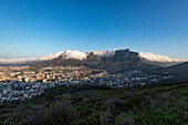 Table Mountain covered in a tablecloth of orographic clouds, Cape Town, South Africa, Africa