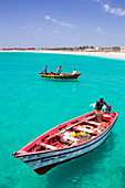 Fishermen bringing their catch of fish in fishing boats to Santa Maria, Sal Island, Cape Verde Islands, Atlantic, Africa