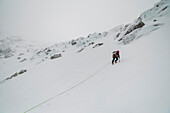 Ice climber leading up into Open Book in Tuckerman Ravine on Mount Washington