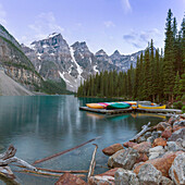 Moraine Lake with canoes at shoreline