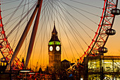 'Millennium Wheel and Big Ben framed at sunset; London, England'