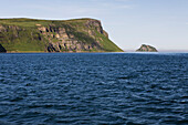 'The Pallisade Cliffs In Ikatan Bay Of False Pass, Also Known As Isanotski Strait, In Summertime; Southwest Alaska, United States Of America'