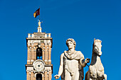 The bell tower of the senator's palace Palazzo Senatorio with an equestrian statue, Rome, Latium, Italy