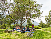 Groupe of people, picnic Botanics garden Kirstenbosch, Cape Town, South Africa