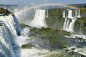 Rainbow over the Iguazu Falls, viewed from the Brazilian side, UNESCO World Heritage Site, Foz do Iguacu, Parana State, Brazil, South America