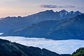 View towards High Tauern with Wiesbachhorn, fog in valley of Salzachtal, Pinzgau walk, Kitzbuehel Alps, Salzburg, Austria