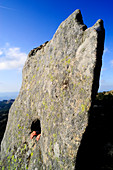 Climber hands in a hole. Valliciola, Sardinia, Italy