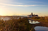 Discovery Park Lighthouse at sunset, Seattle, Washington State, United States