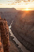 Sun rises over Toroweap Overlook and the Colorado River at the North Rim of Grand Canyon National Park