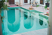 Photograph of empty swimming pool in Moroccan riad, Marrakech, Morocco