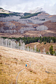 Long Exposure Of Man Running On Trail Near Crested Butte