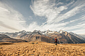 man taking photos from the landscape around Matterhorn, Wallis, Switzerland, europe