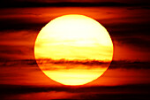 France, Normandy. Closeup of the sun shortly before sunset.