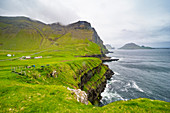 Huge cliffs in Gasadalur, Vagar, Faroe islands, Denmark