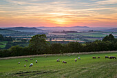 Cotswold landscape and distant Malvern Hills at sunset, Farmcote, Cotswolds, Gloucestershire, England, United Kingdom, Europe