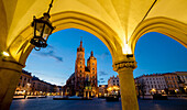 St. Mary's Church ,St. Marys Basilica, and main square illuminated at dawn, UNESCO World Heritage Site, Krakow, Poland, Europe