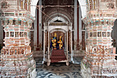 The Radha Krishna shrine inside the beautifully carved and decorated Lalji terracotta temple, built in 1739, Kalna, West Bengal, India, Asia