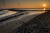 Tidal pool in the Wattenmeer National Park at sunset, German North Sea, Wremen, Land Wursten, Cuxhaven, Lower Saxony, Germany