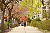 Woman running in Boston, Massachusetts, USA