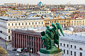 Photograph with aerial view of St. Petersburg and statue from colonnade of St. Isaac Cathedral, Russia