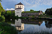 Nykoepingshus castle on a small lake, Sweden