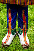 Legs of Asian woman wearing traditional clothing
