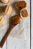 Wooden spoon with filling for cookies