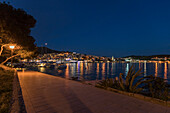 Scenic view of waterfront at night