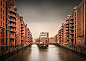 UNESCO World Heritage Speicherstadt - warehouse dock, castle during rain, Hamburg, Germany