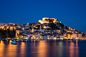 Illuminated St. Michael's Fortress and waterfront buildings at dusk, Šibenik, Šibenik-Knin, Croatia