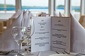 'Menu and table setting for special ''Zaren Dinner'' (tsar dinner) in Panorama Bar of river cruise ship Excellence Katharina of Reisebüro Mittelthurgau (formerly MS General Lavrinenkov), Volga-Baltic Canal, Russia'
