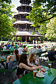 The beer garden at the Chinese Tower in the English Garden, Munich, Bavaria