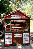 Sweet temptations are offered in the beer garden at the Inselmühle in Munich, Bavaria