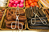Landjäger, dried and smoked sausages are part of the food offerings at beer ardens, like at the beer garden at the Seehaus in the English Garden in Munich, Bavaria