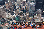 tourists contemplating the view of new york from the top of the rock observatory, manhattan, new york city, state of new york, united states, usa