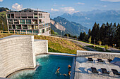 tourists enjoying the outdoor pool of the rigi kaltbad spa, thermal bath, rigi kaltbad, lake lucerne region, canton of lucerne, switzerland