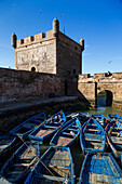 traditional boats at the skala of the port and its cannons, essaouira, mogador, atlantic ocean, morocco, africa