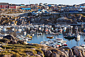 boats in the fishing port, ilulissat, greenland
