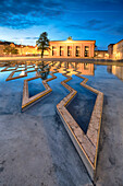 Thorvaldsens Museum reflected in the fountain of Bertel Thorvaldsen's Square at night, Copenhagen, Denmark, Europe