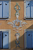 France, Var department, city of Cogolin, zoom on old pink house with blue shutters