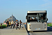 France, Lower Normandy Region, Manche Department, Mont St-Michel, free shuttle bus between the monument and car parking.
