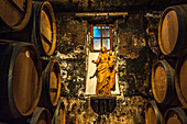 France, Gironde, Medoc, wine warehoude of the Chateau La Tour-de-By, wooden statue of a Madonna and Child