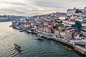 Aerial view from Dom Luis I Bridge in Porto city on Iberian Peninsula, second largest city in Portugal, Bishop's Palace on right side