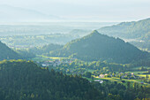 Mountains in the fog at sunrise, Bled, Slovenia, Europe