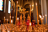 Interior of Cathedral of the Ressurection Russian Orthodox church in Yuzhno-Sakhalinsk with candles and crosses, Kosakov, Sachalin Island, Russia, Asia