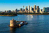 Fort Denison in Sydney Harbour with the city in the background, Sydney, New South Wales, Australia