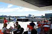 Cafe on the roof terrace of the Museum of Contemporary Art with Opera House in the background, Sydney, New South Wales, Australia