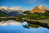 Southern Alps reflecting in mountain lake, Key Summit, Fiordland National Park, UNESCO Welterbe Te Wahipounamu, South Land, South island, New Zealand